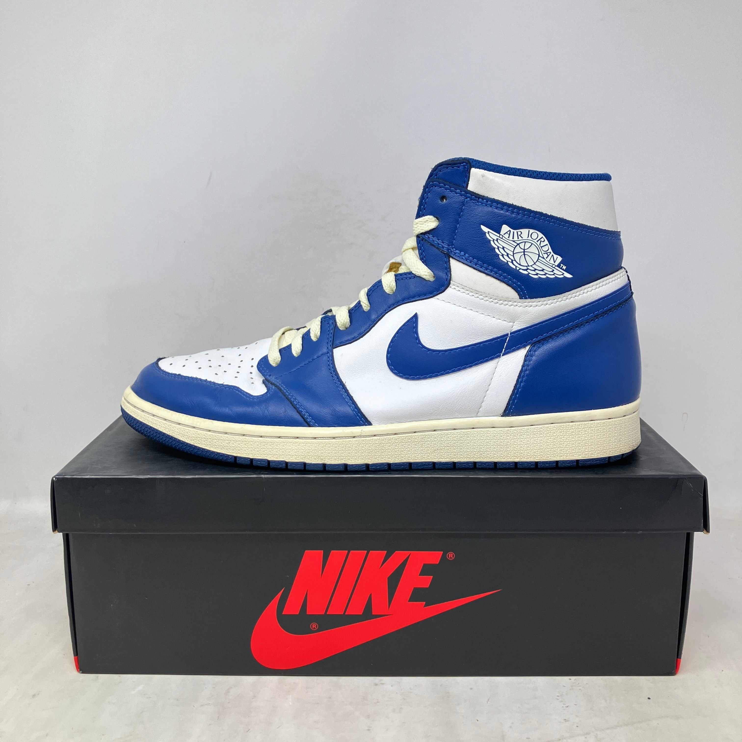 Jordan 1 Retro Storm Blue sneaker pre owned with all accessories included