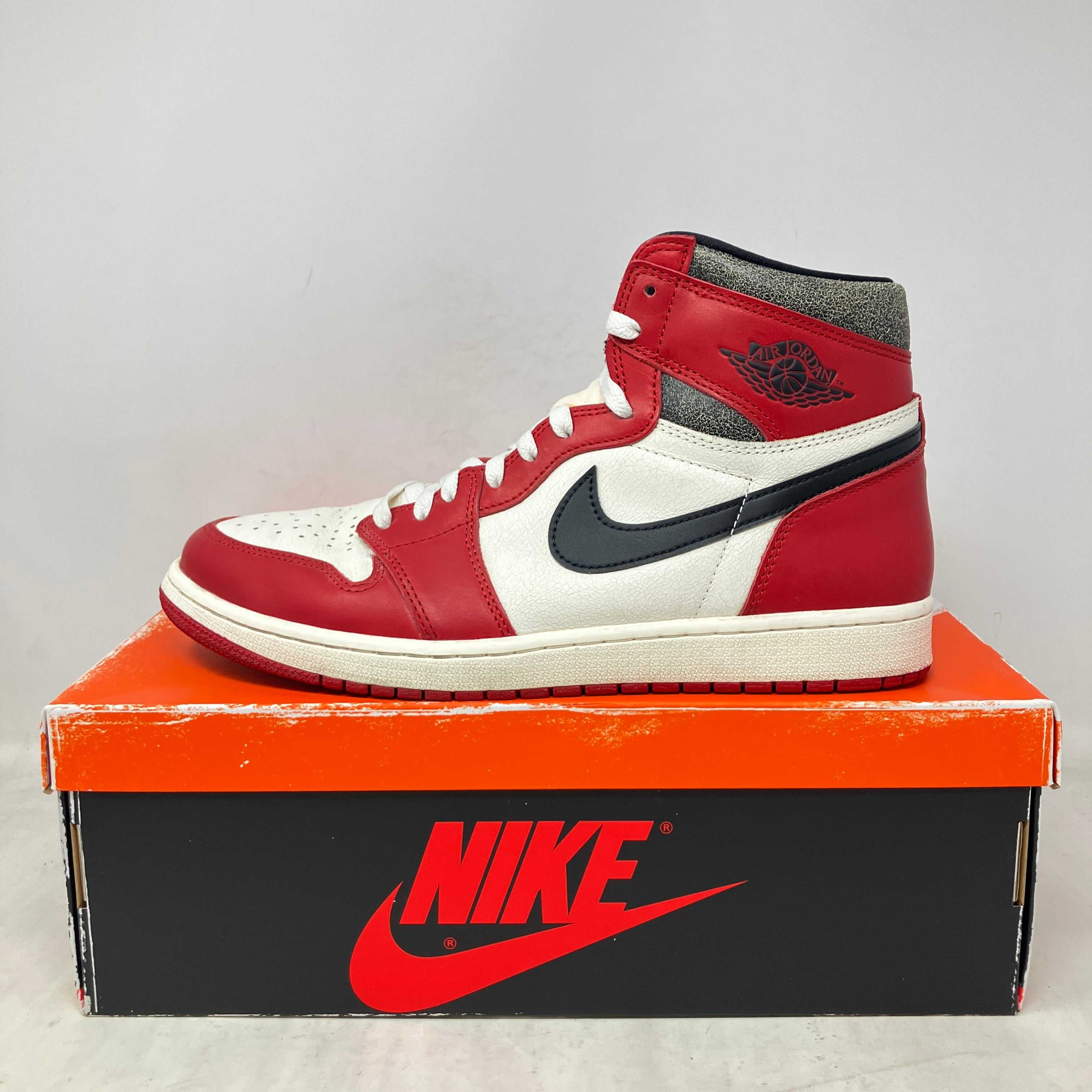 Jordan 1 Retro High OG Chicago Lost and Found pre-owned sneakers with all accessories included