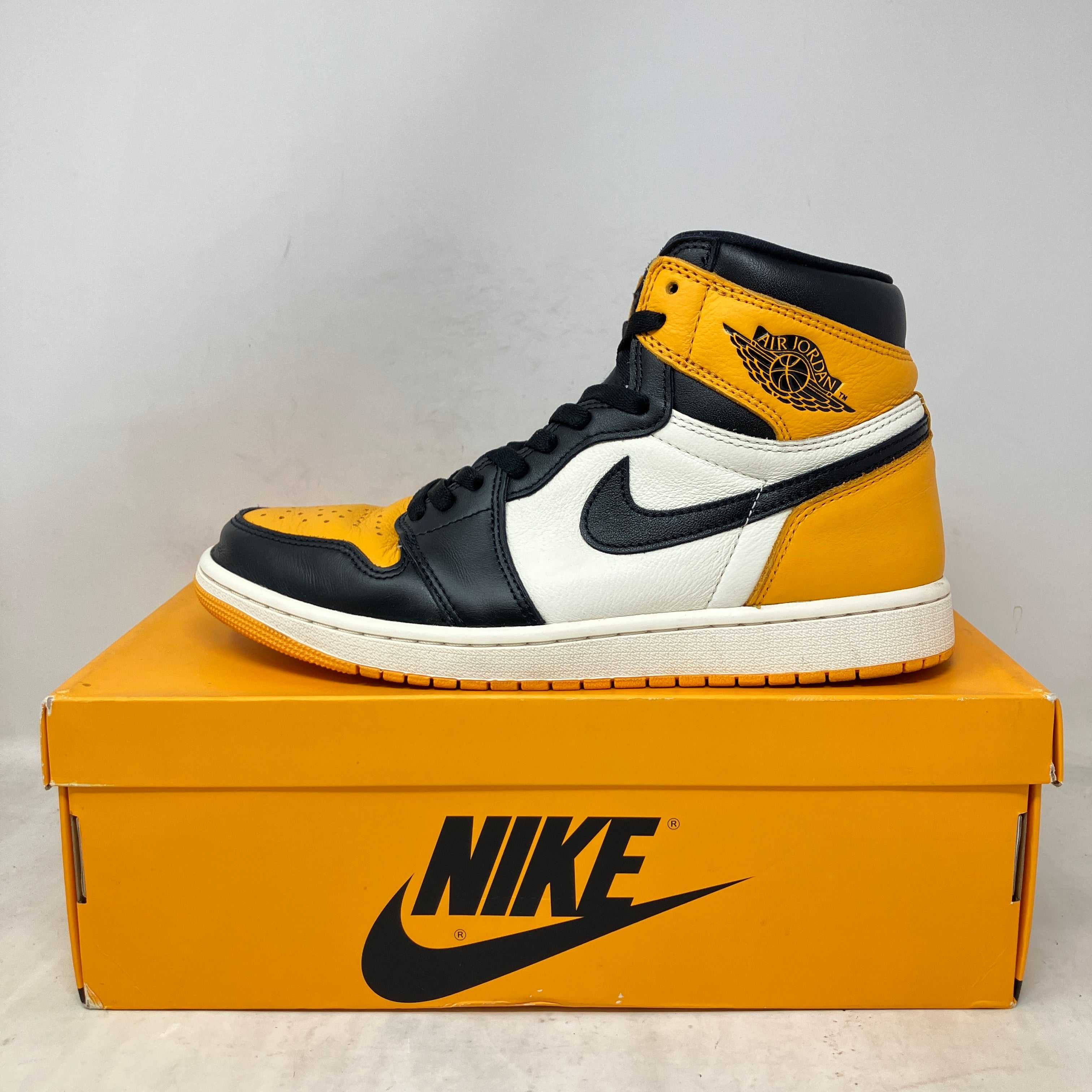 Jordan 1 Retro High OG Taxi pre-owned sneakers with all accessories included