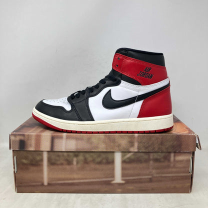 Jordan 1 Retro High OG Black Toe pre-owned sneaker with accessories