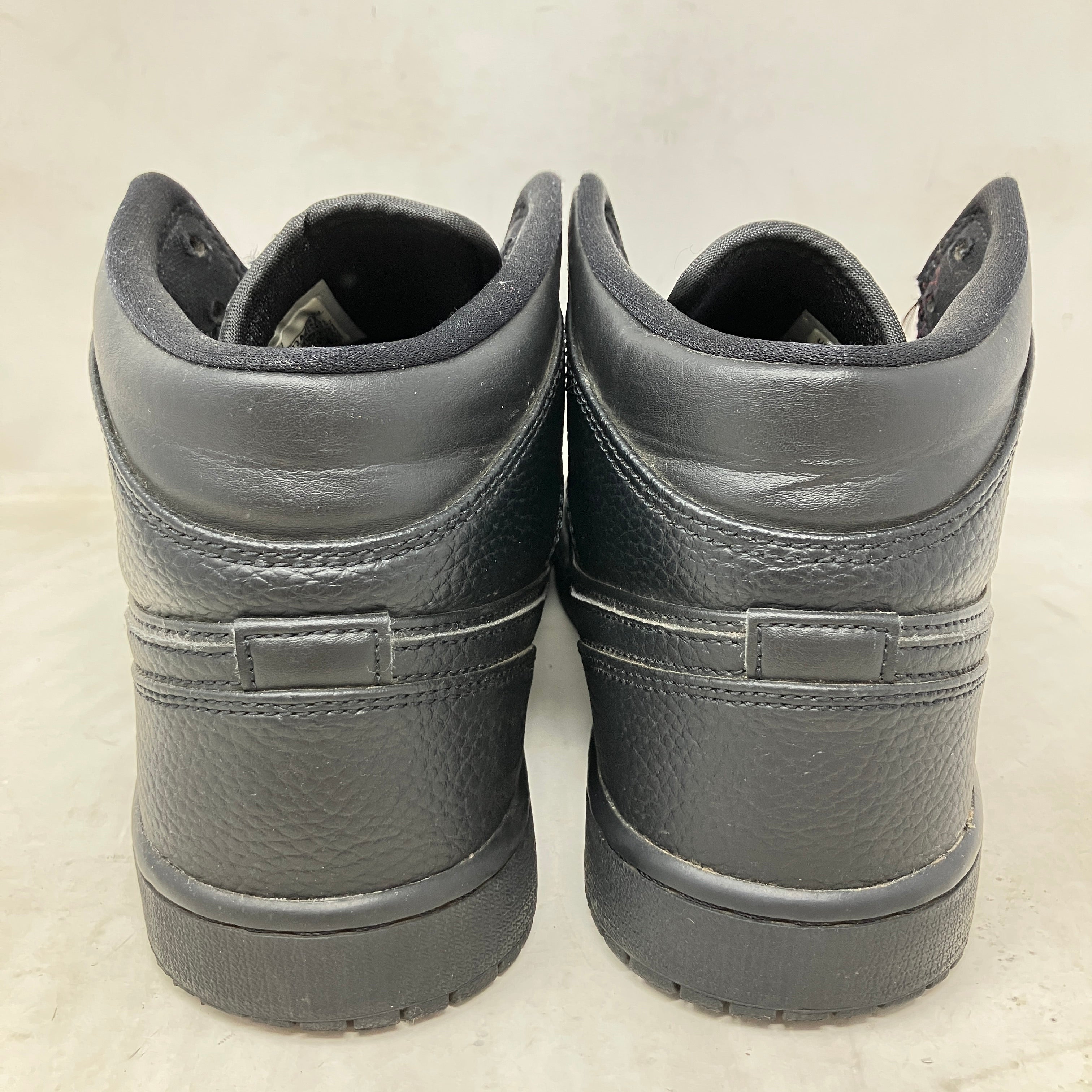 Jordan 1 Mid Triple Black