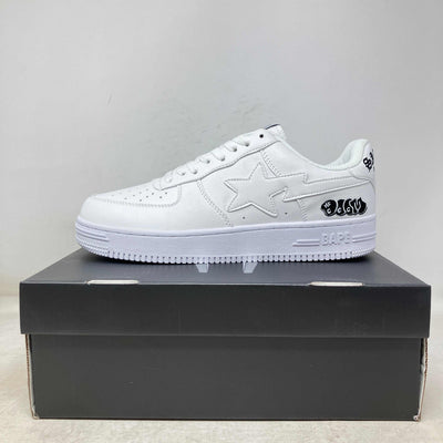 Savior Studios white leather low-top sneaker with tonal star panels, embossed sole and small black heel accents