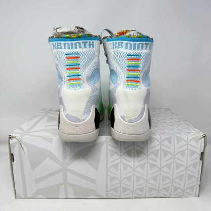 Nike Kobe 9 Elite sneakers in pre-owned condition, colorful design displayed.