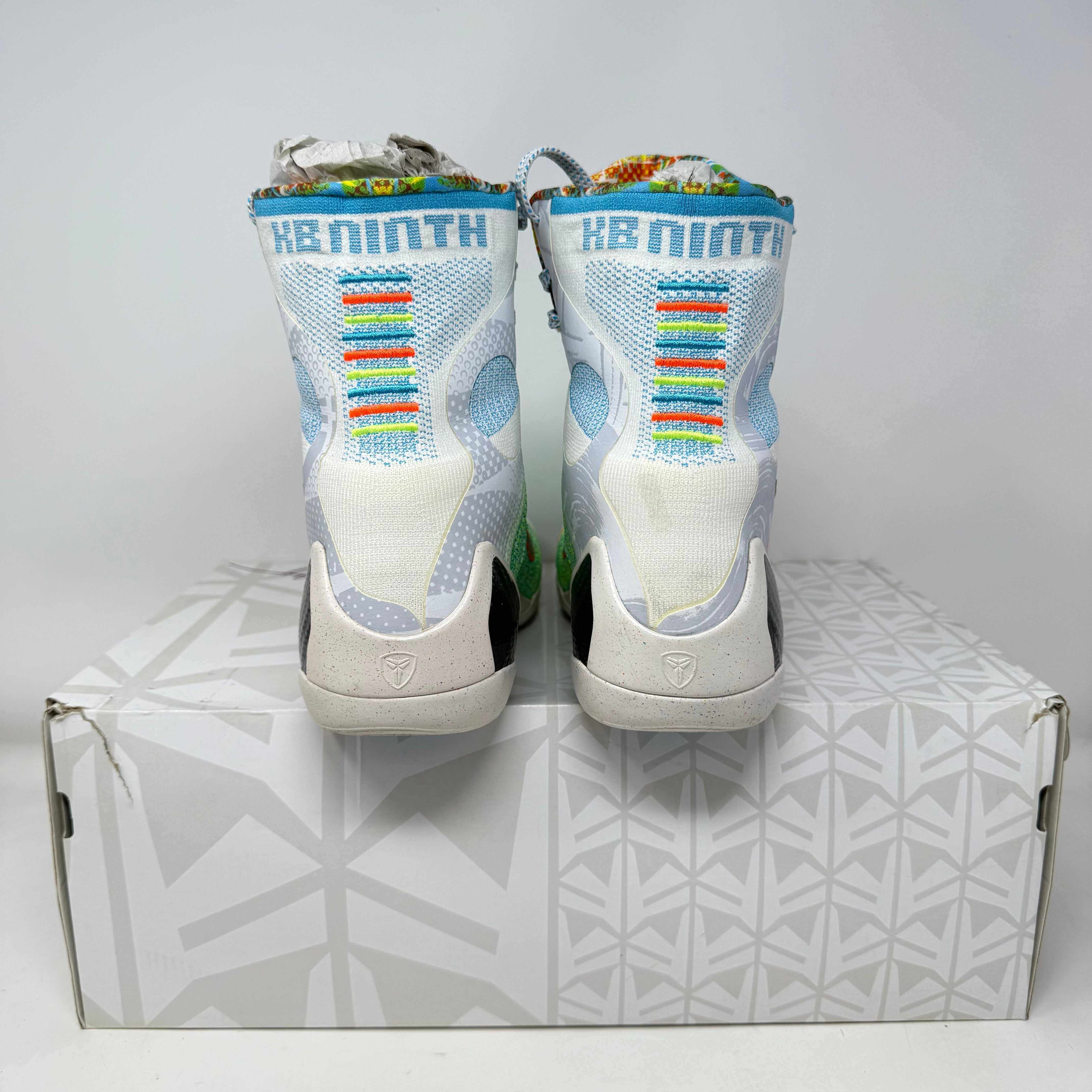 Nike Kobe 9 Elite sneakers in pre-owned condition, colorful design displayed.