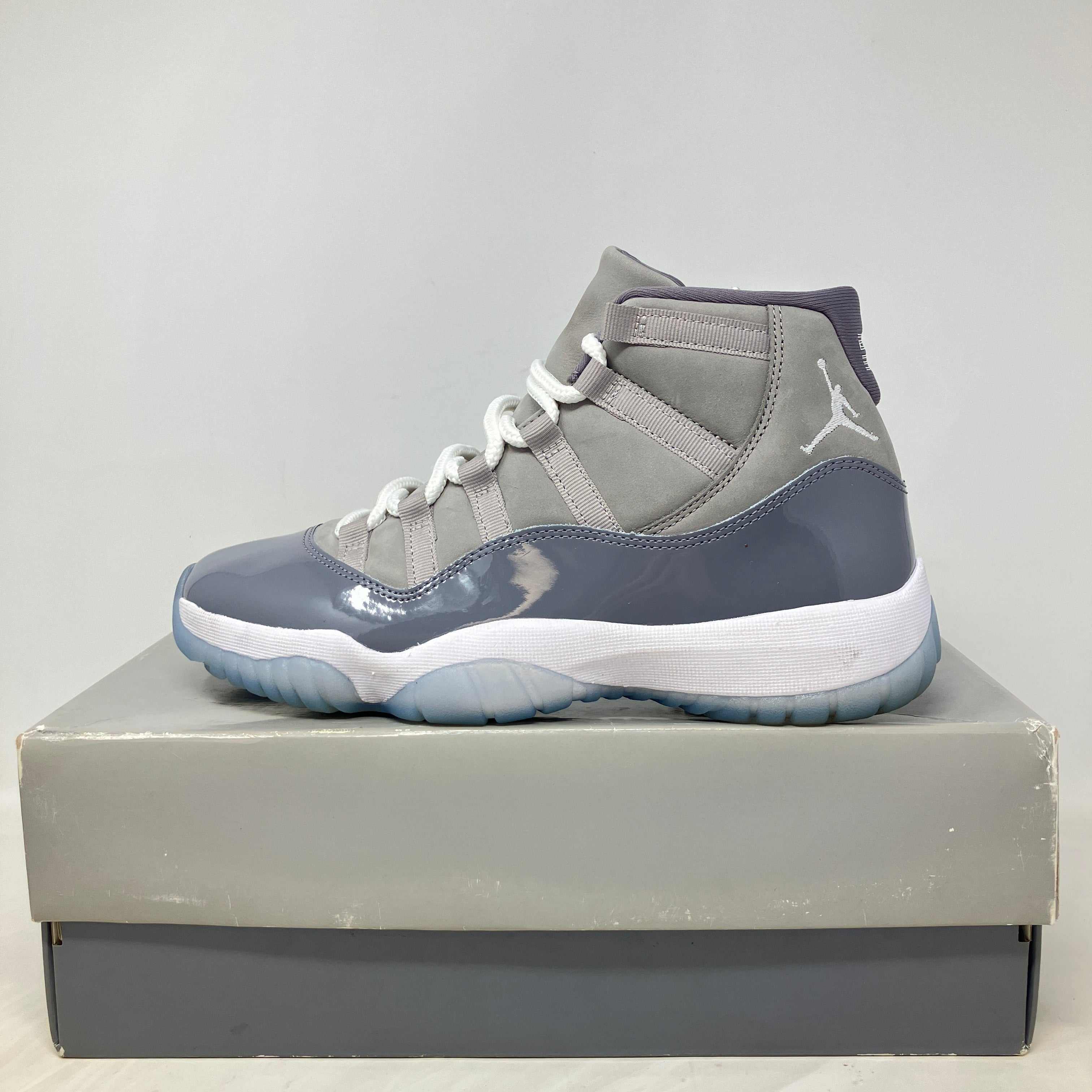 Jordan 11 Retro Cool Grey pre-owned sneaker with all accessories on box
