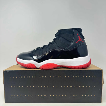 Jordan 11 Retro Playoffs Bred 2019 sneaker in black and red on box with accessories included