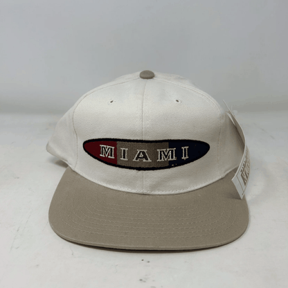 Vintage Miami Hurricanes American Needle snapback hat in beige and white, brand new condition
