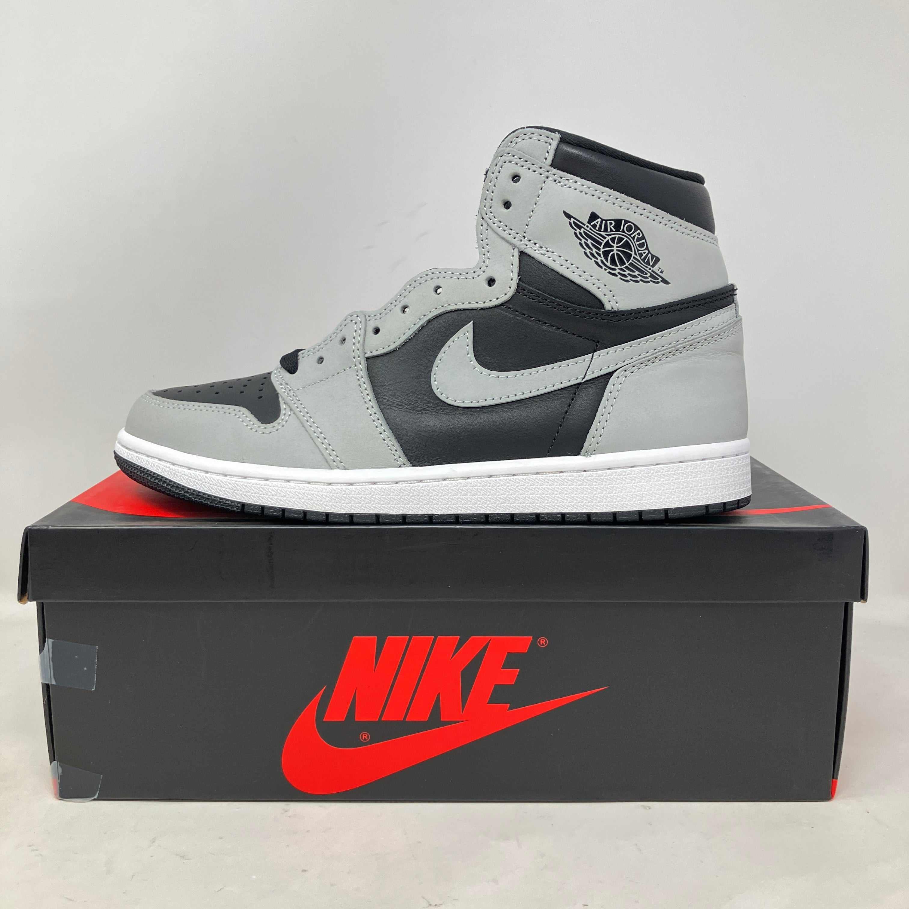 Jordan 1 Retro High Shadow 2.0 preowned sneaker on Nike box with accessories included