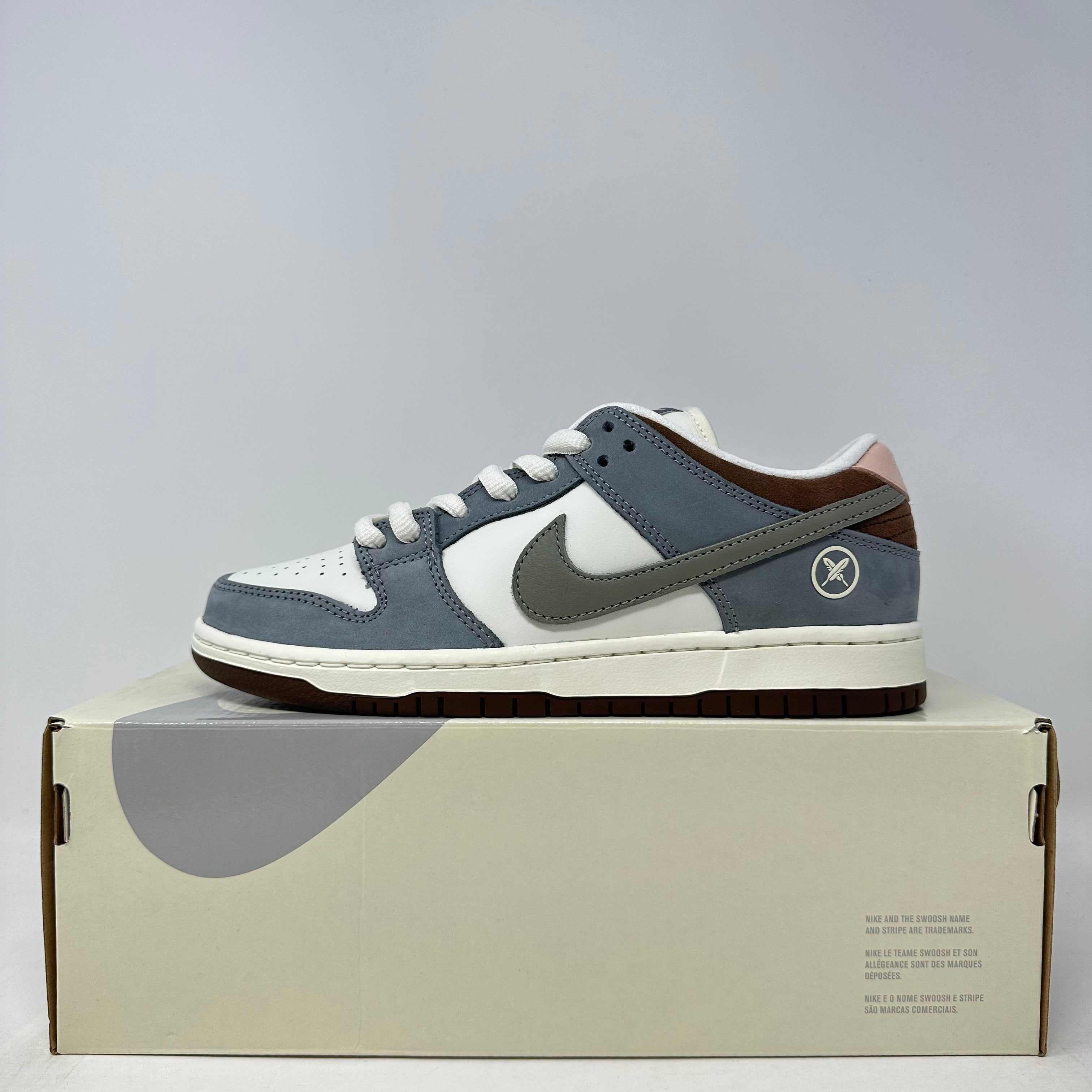 Nike SB Dunk Low Yuto Horigome sneakers in gray, white, and brown on box, brand new with accessories