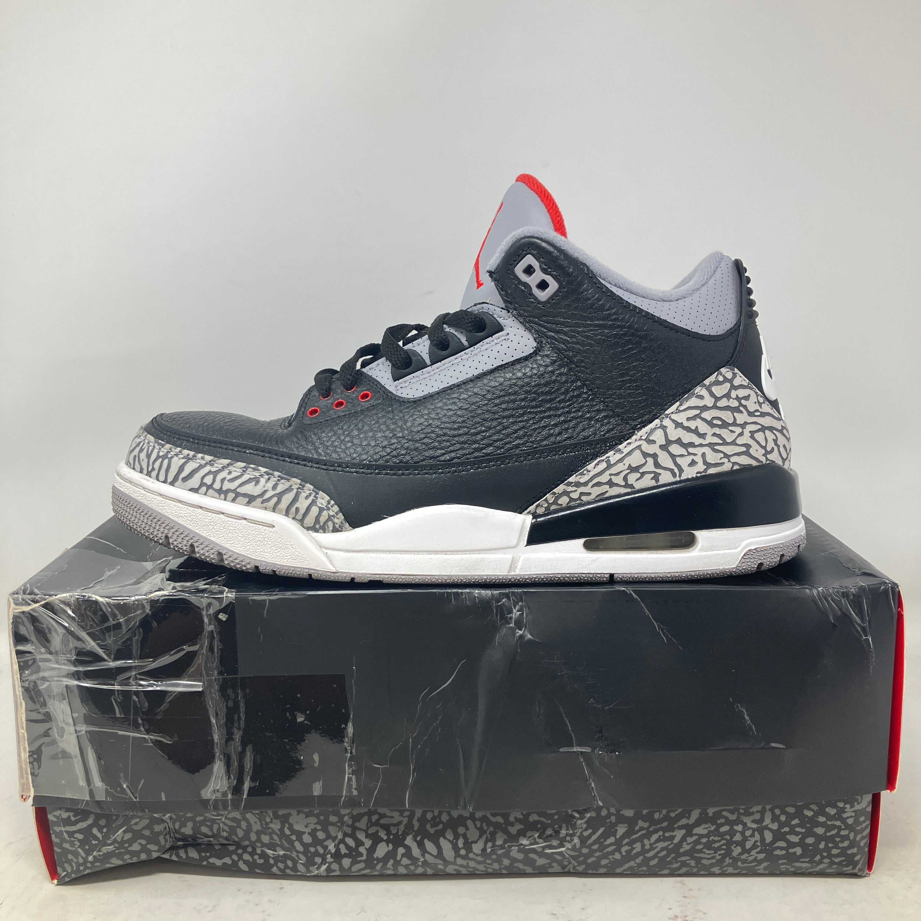 Jordan 3 Retro Black Cement 2018 pre-owned sneaker with original accessories on box