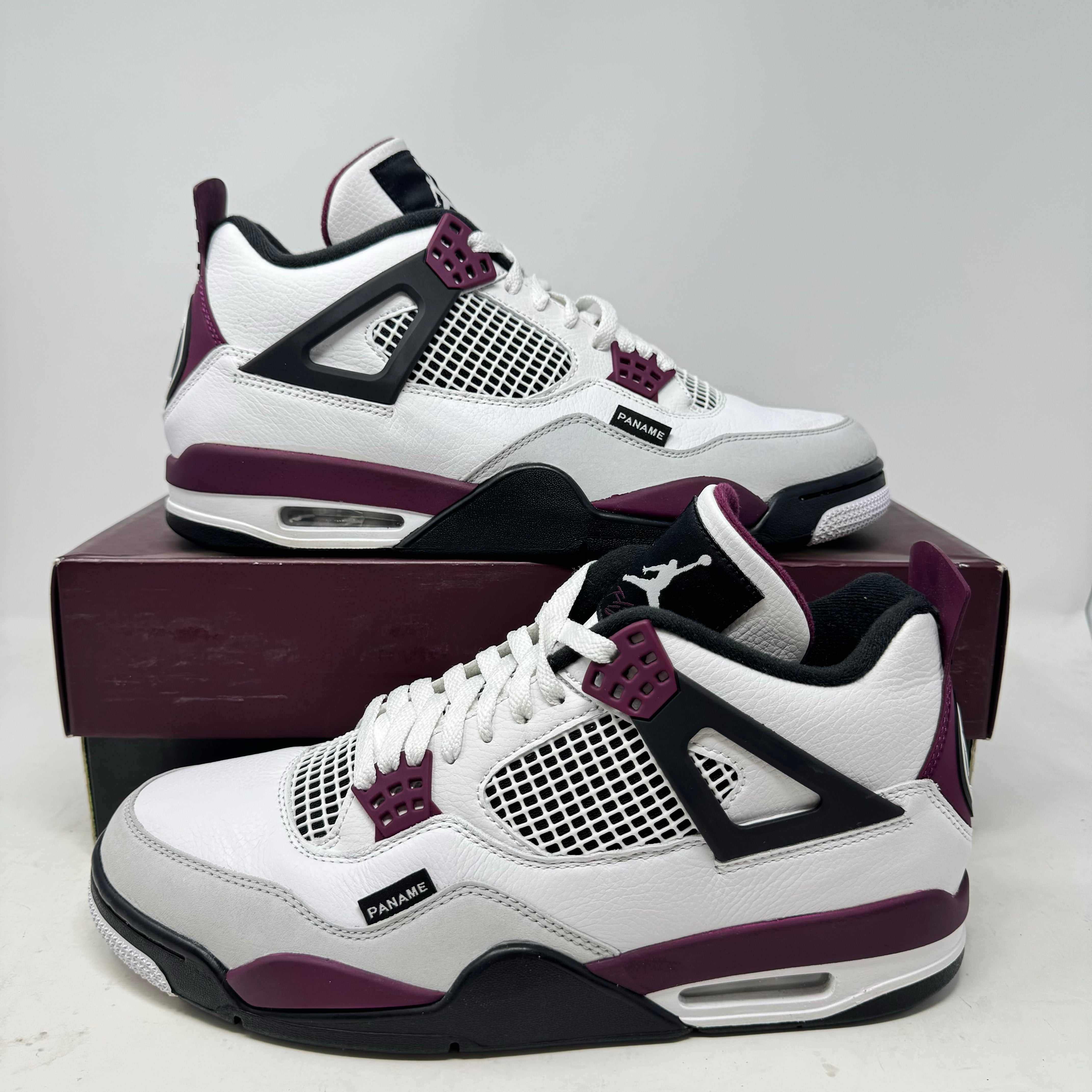 Pre-owned Jordan 4 Retro PSG Paris Saint-Germain sneakers with original accessories.