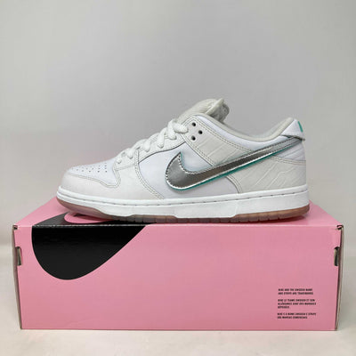 Nike SB Dunk Low Diamond Supply Co. White sneaker with silver swoosh on pink box