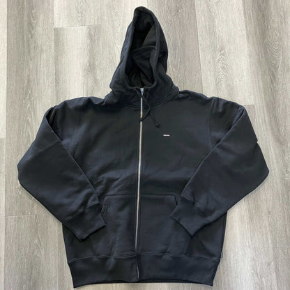 Supreme Small Box Facemask black zip up hooded sweatshirt flat lay on wooden floor