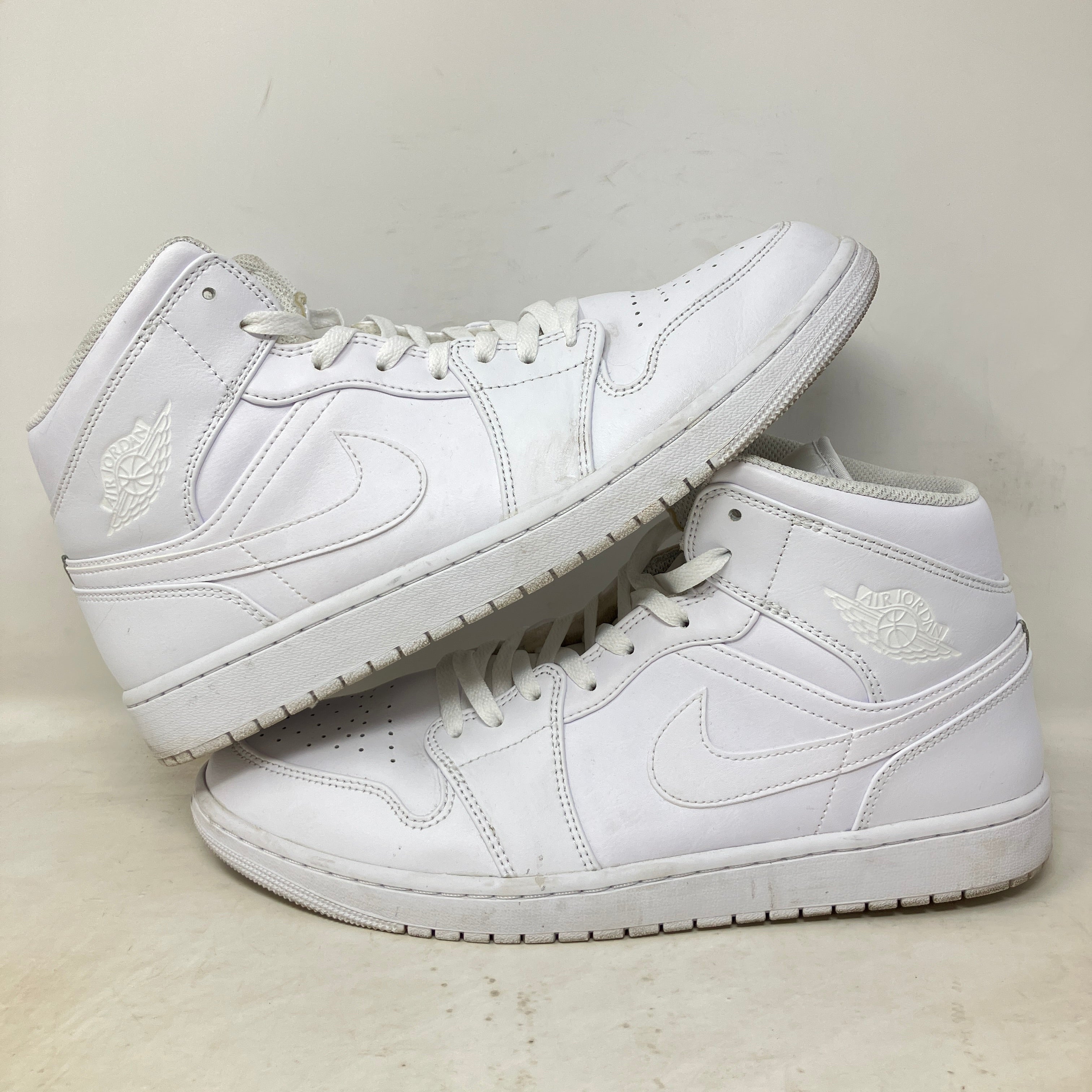 Jordan 1 Mid Triple White