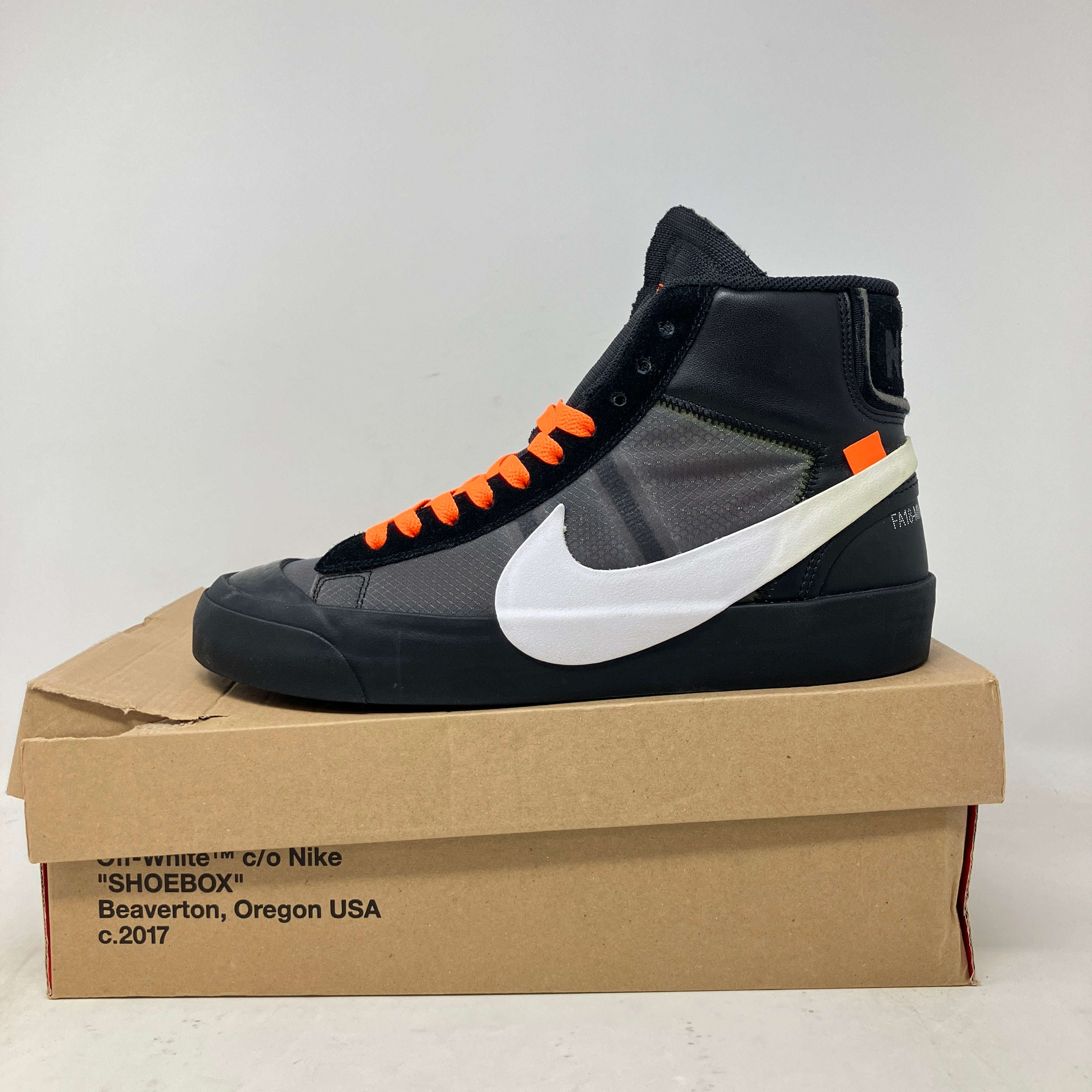 Nike Blazer Mid Off-White Grim Reaper sneakers, pre-owned condition, with original accessories.
