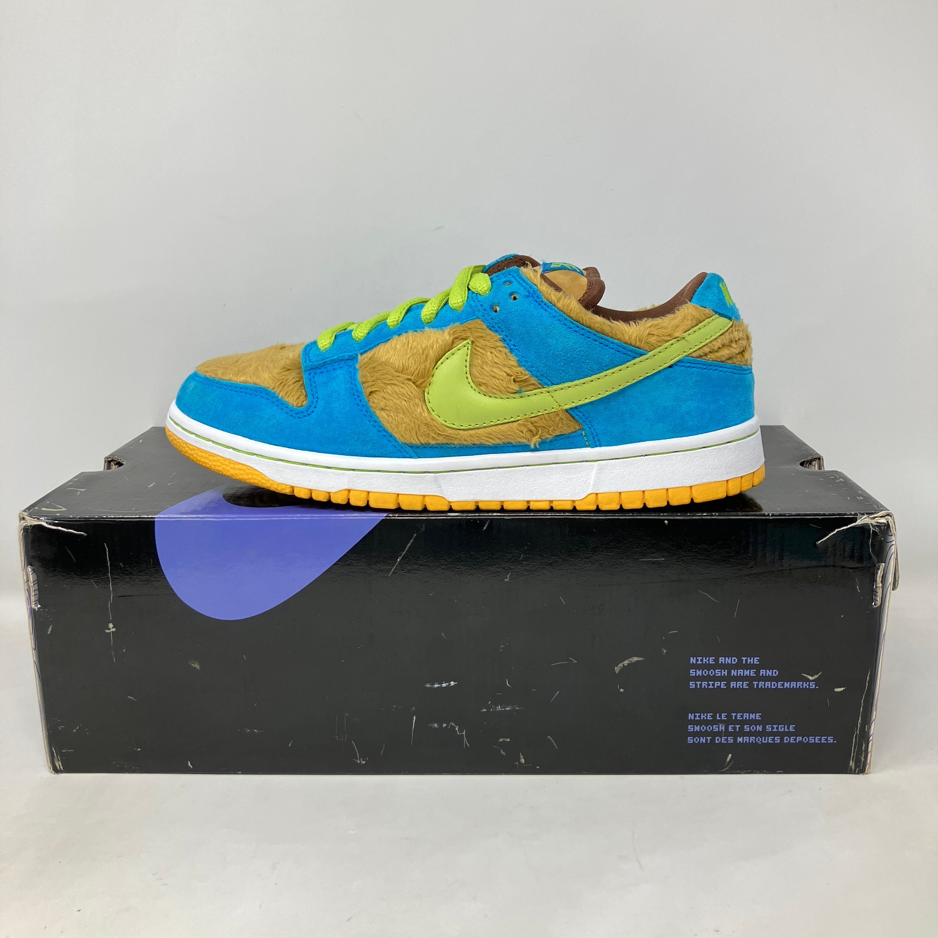Pre-owned Nike SB Dunk Low Baby Bear sneaker with blue, green, and brown suede on original box and accessories included