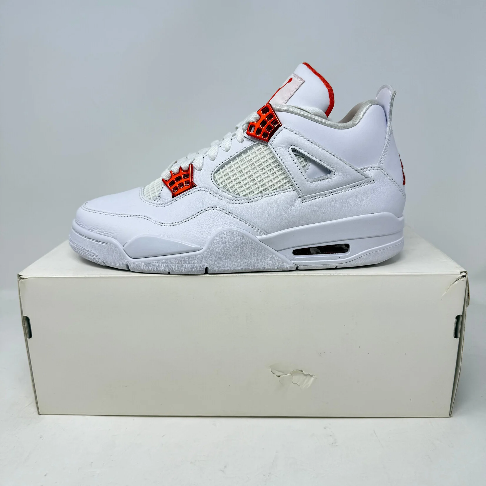 Jordan 4 Retro Metallic Orange