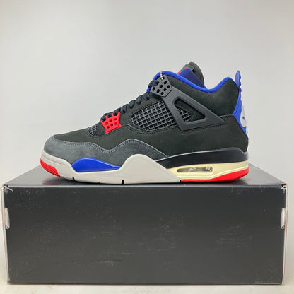 Jordan 4 Retro Rare Air sneaker in black with red, blue, and gold detailing, brand new on black shoebox