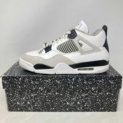 Jordan 4 Retro Military Black pre-owned sneaker on speckled box with all accessories included
