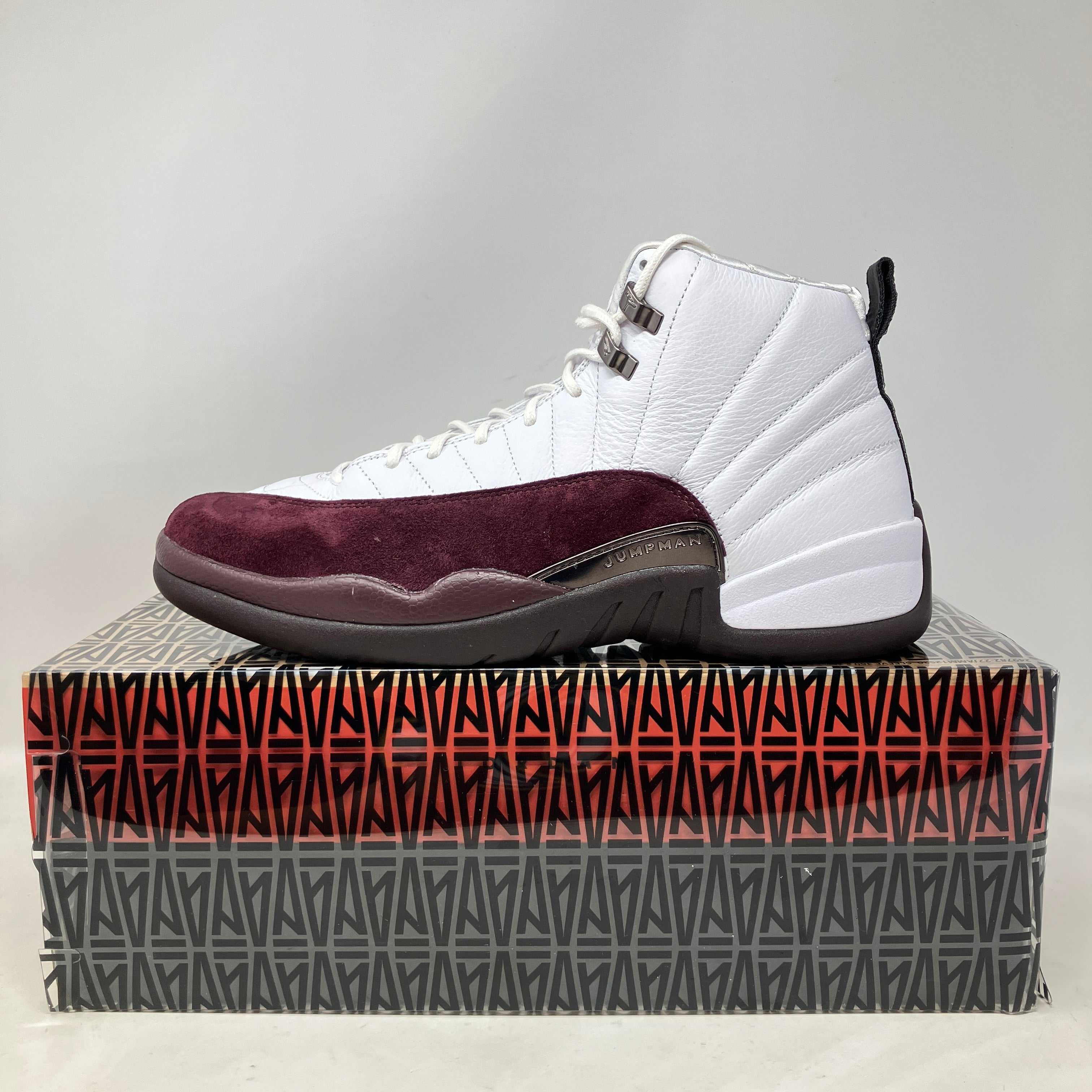 Jordan 12 Retro SP A Ma Maniére White women's sneaker on branded box, preowned with accessories included