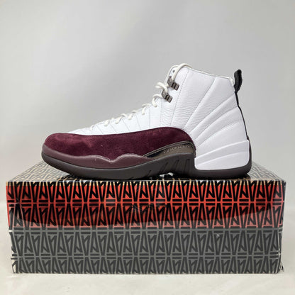Jordan 12 Retro SP A Ma Maniére White women's sneaker on branded box, preowned with accessories included
