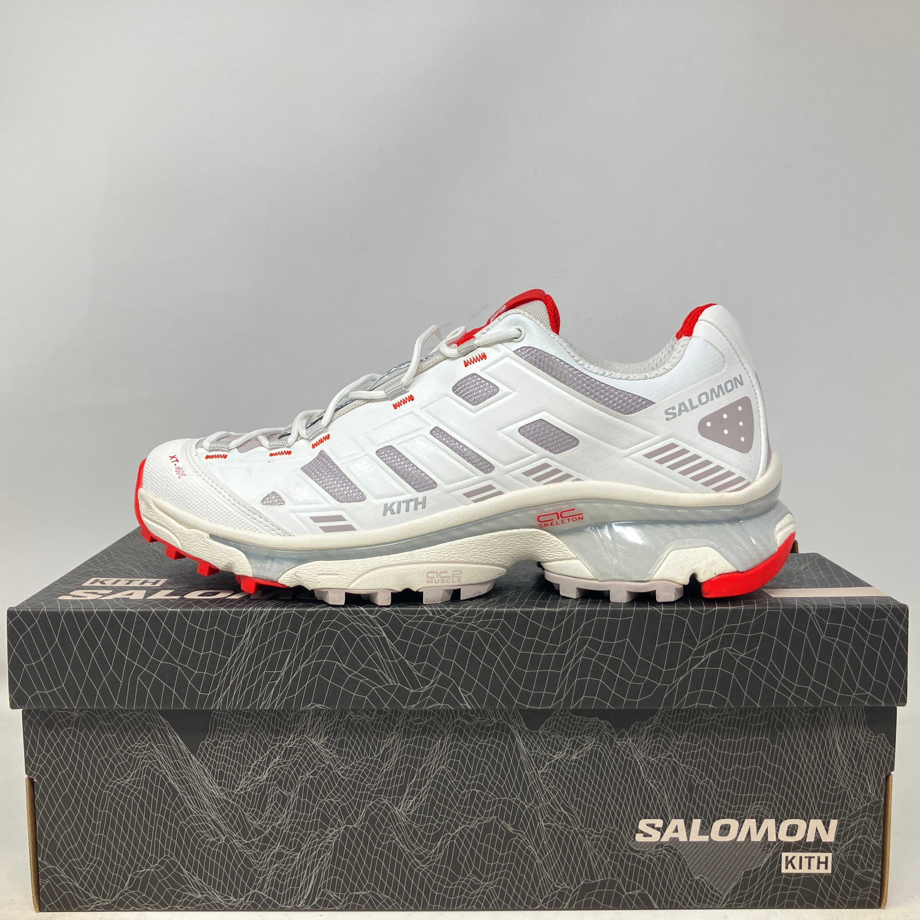 Salomon XT-4K Kith Kithmas white red trail running shoe on black Salomon box