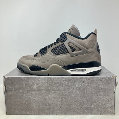 Jordan 4 Retro Cave Stone sneaker in pre-owned condition with all accessories on gray box
