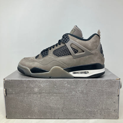 Jordan 4 Retro Cave Stone sneaker in pre-owned condition with all accessories on gray box