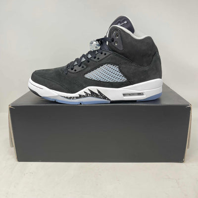 Jordan 5 Retro Moonlight sneaker in black suede with icy blue mesh side panel, white midsole, and translucent outsole.