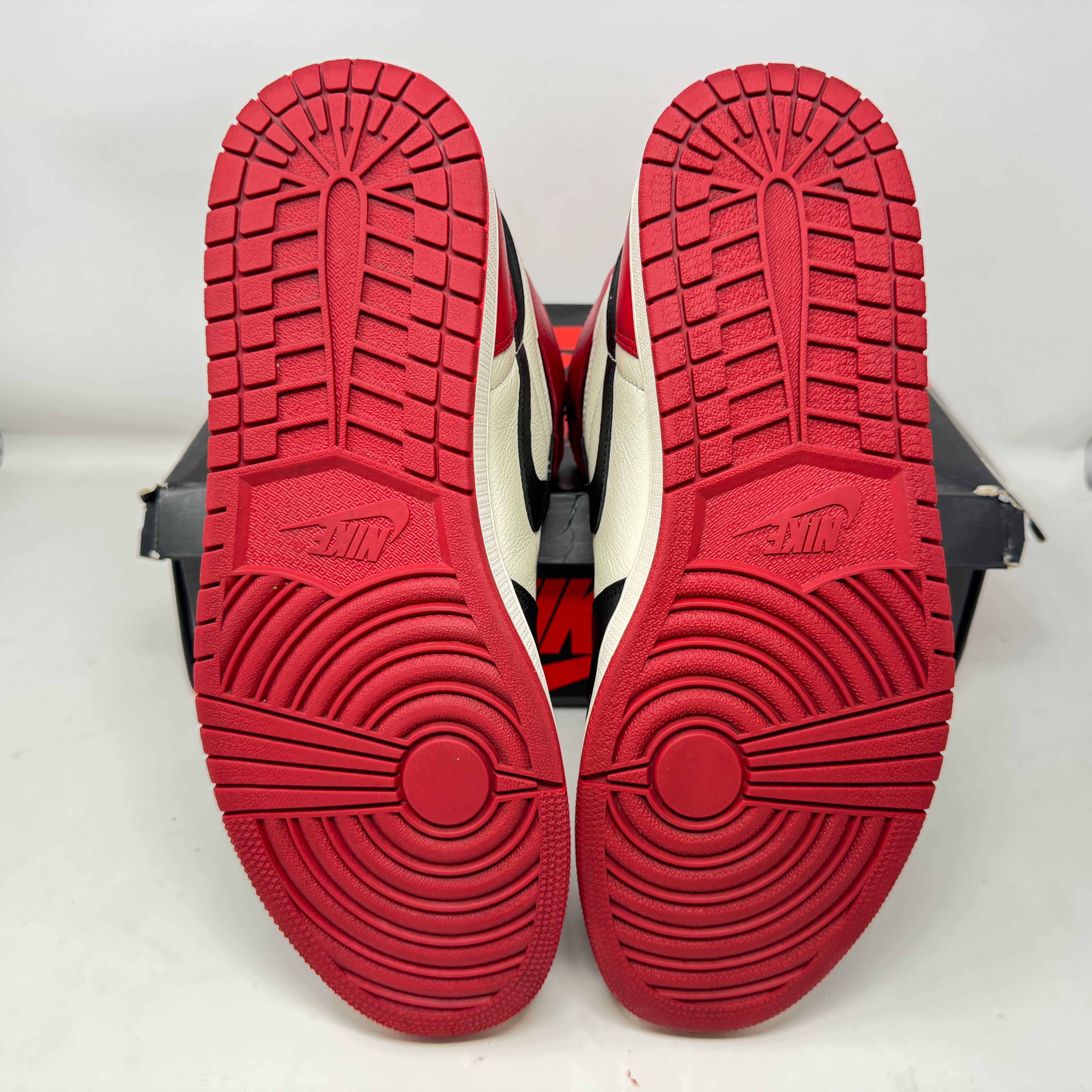 Jordan 1 Retro High Bred Toe sneakers, preowned, with accessories included.