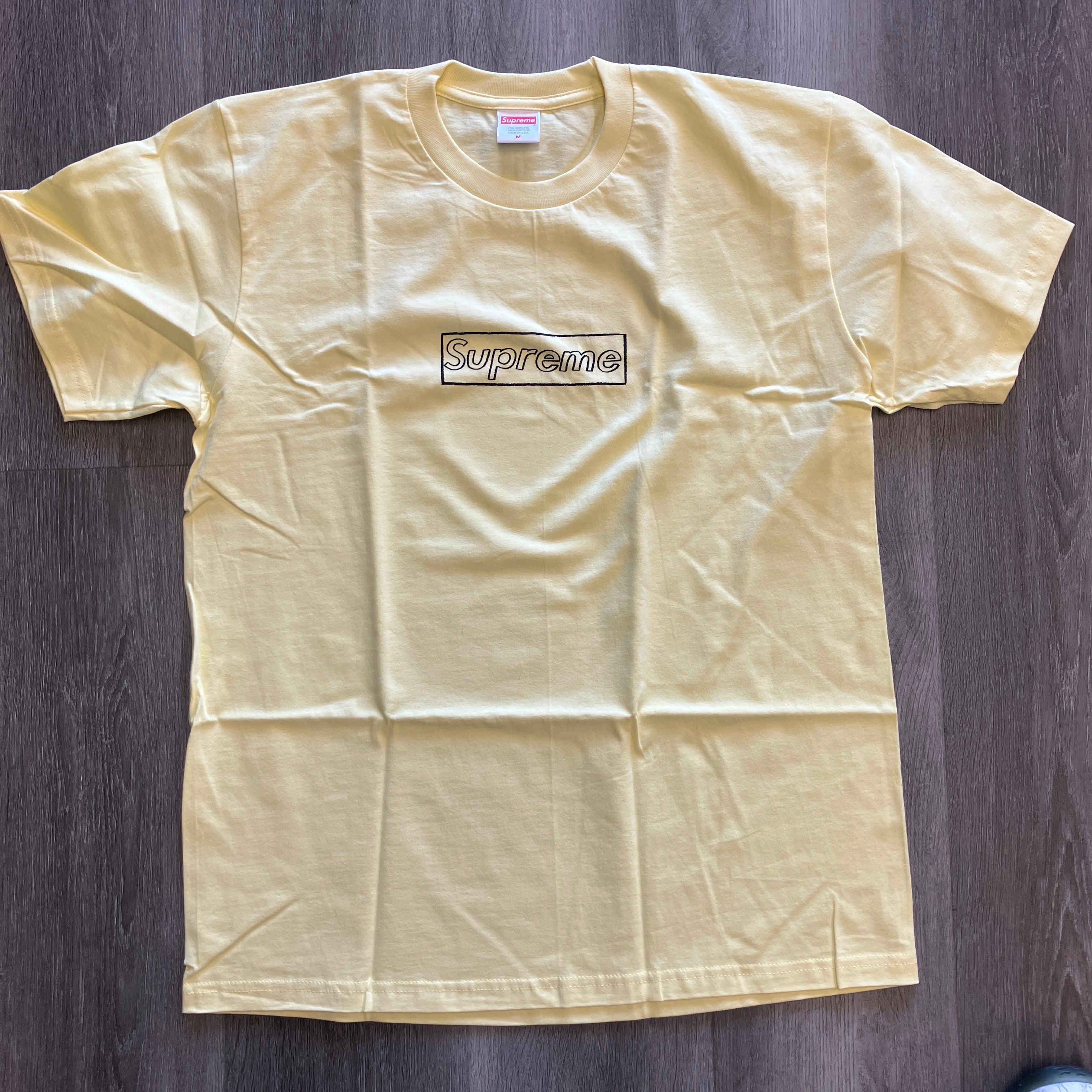 Supreme KAWS Chalk Logo Tee Pale Yellow