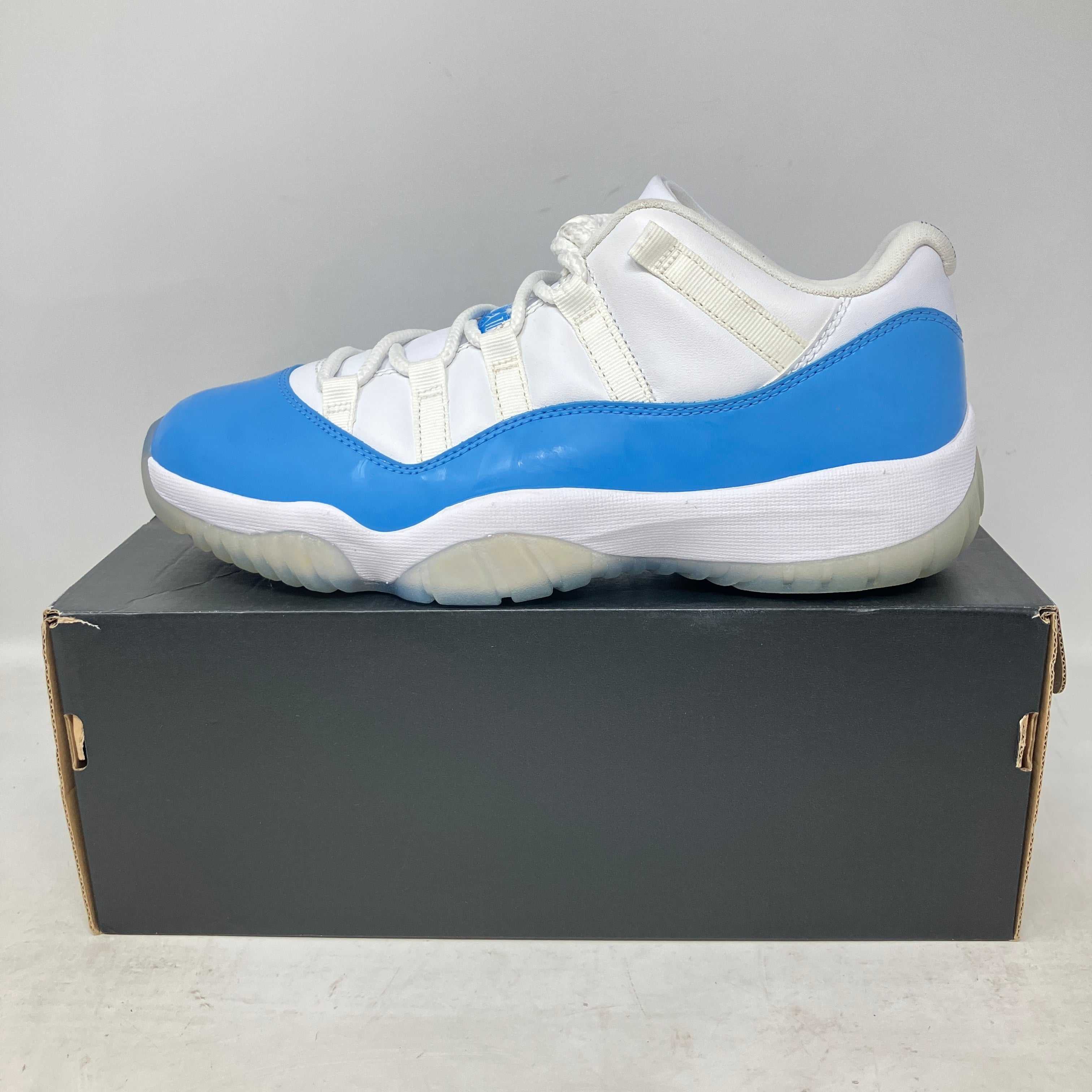Jordan 11 Retro Low University Blue sneaker in brand new condition with all accessories on black box