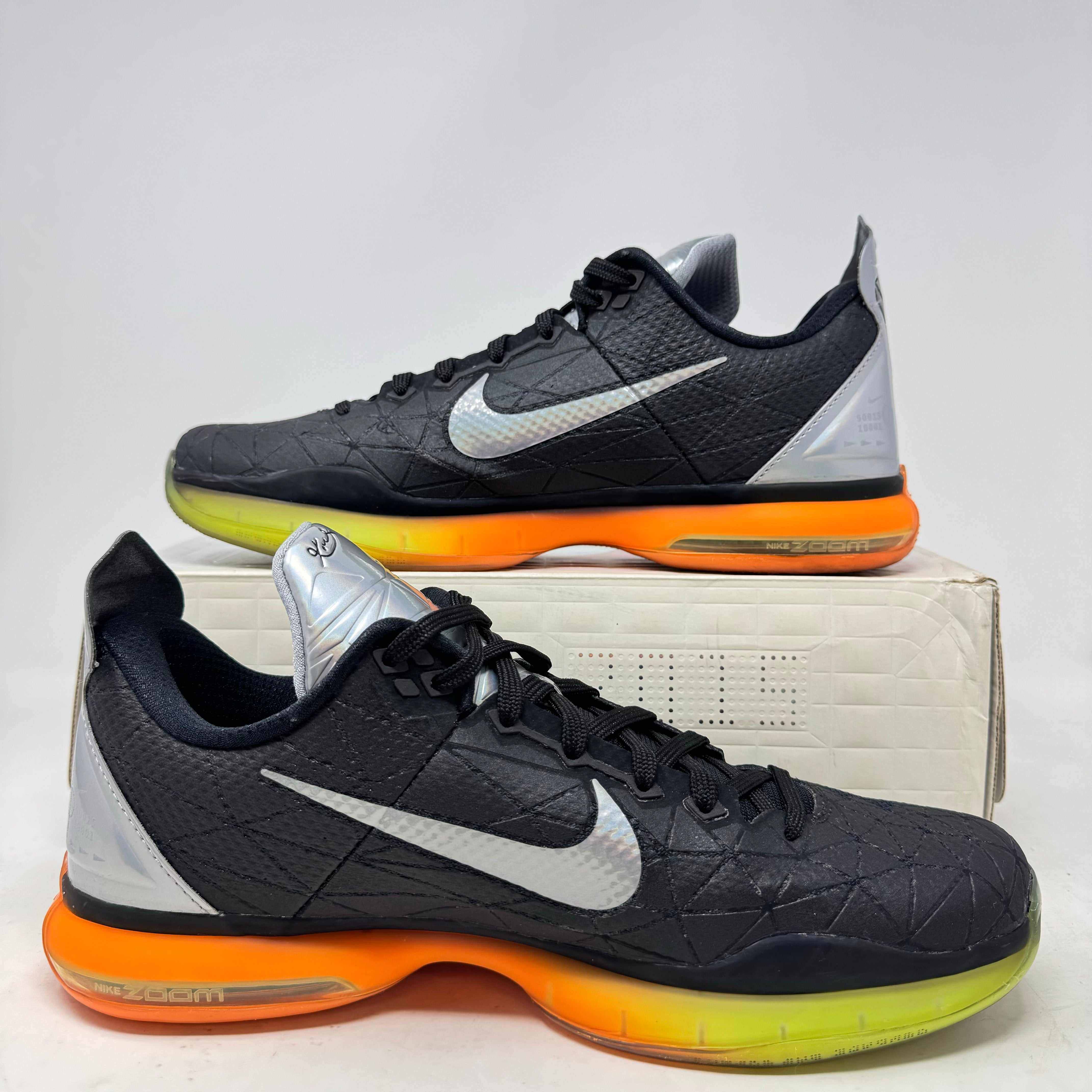 Nike Kobe 10 All-Star sneakers, black with orange and green gradient soles, pre-owned, all accessories included.