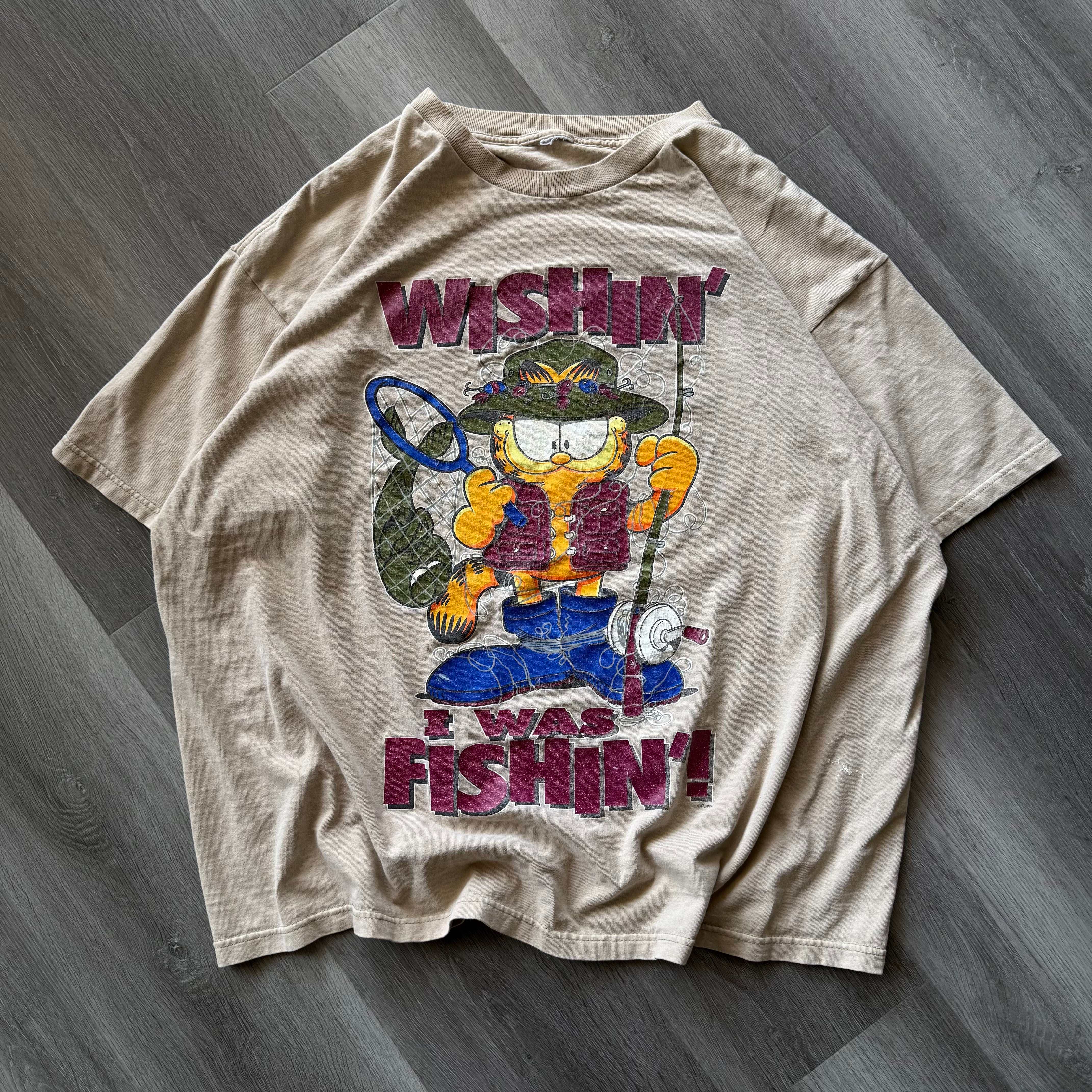 Vintage Garfield Wishin I Was Fishin tee, pre-owned graphic t-shirt featuring Garfield with fishing gear.