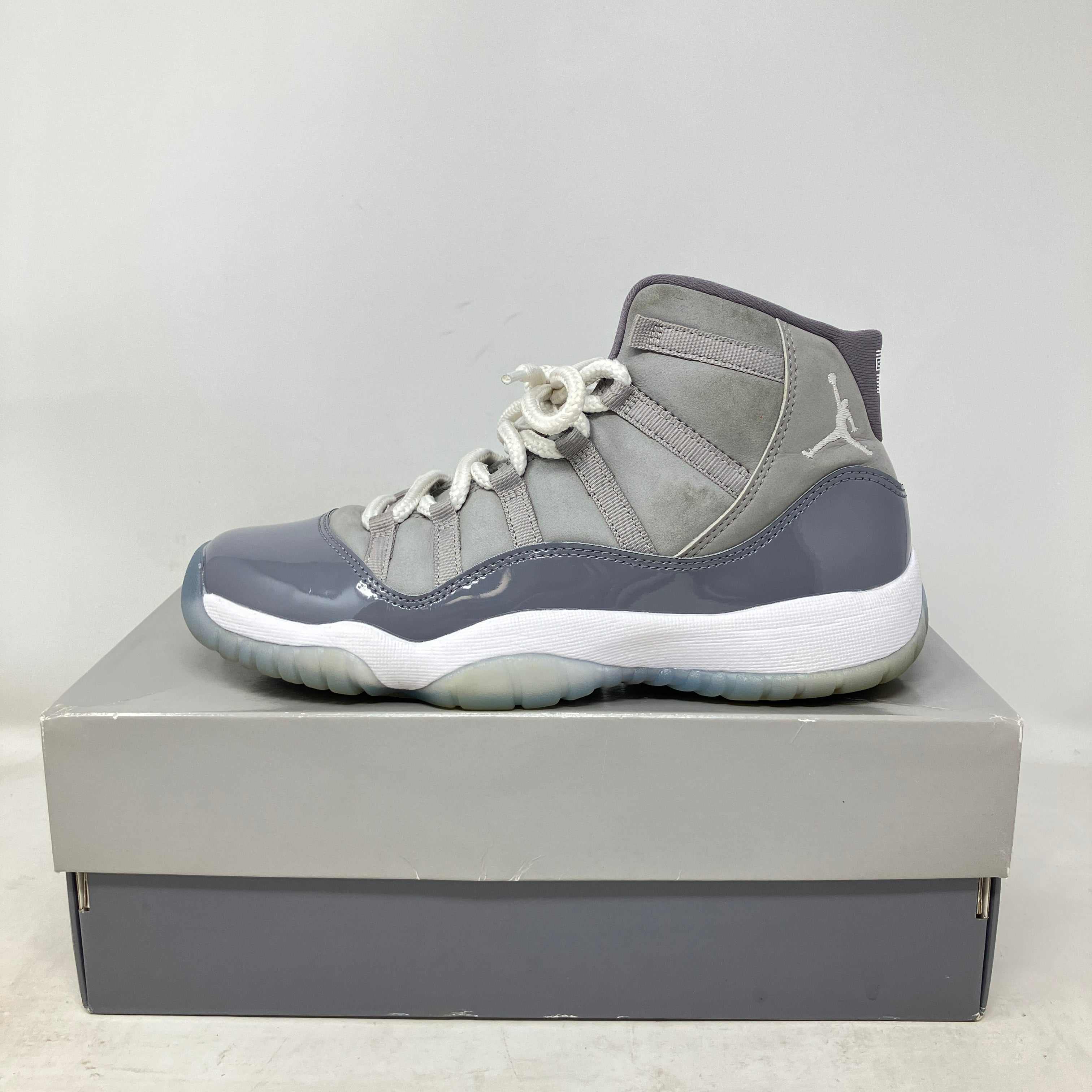 Jordan 11 Retro Cool Grey 2021 GS pre-owned sneaker with full accessories on box