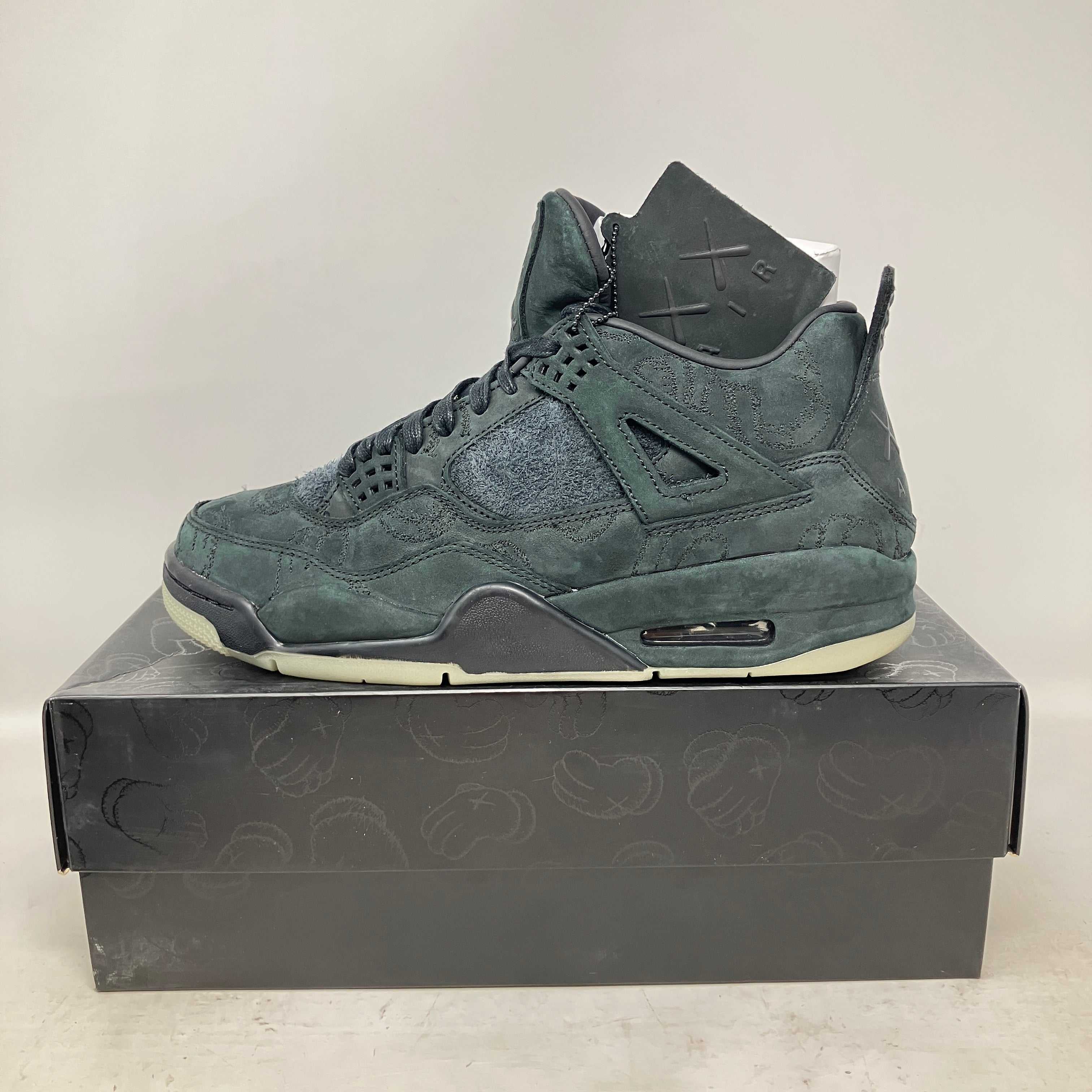 Jordan 4 Retro Kaws black sneaker brand new with all accessories on box