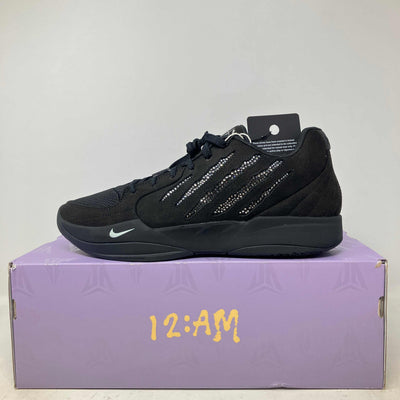 Nike Ja 2 Swarovski black basketball shoe with textured mesh, sparkling crystal stripe details, black sole and white swoosh.