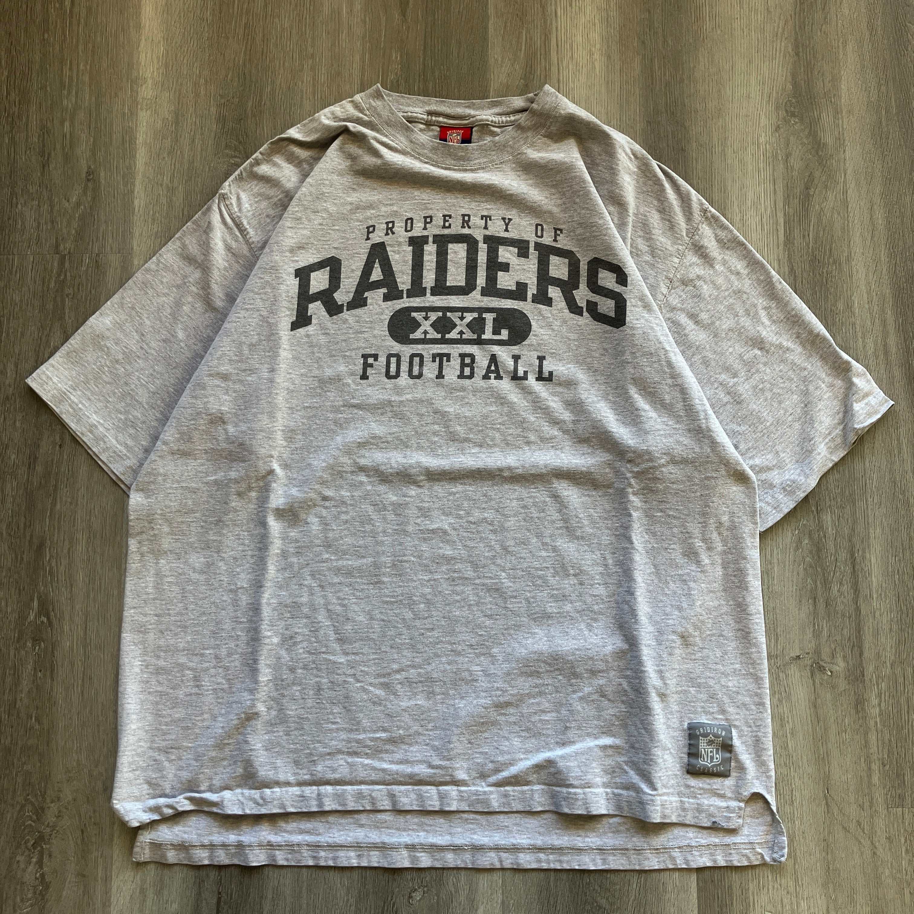 Vintage Property of Raiders tee, pre-owned, XXL, gray with black lettering.