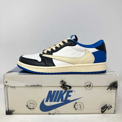 Jordan 1 Retro Low OG sneaker in white leather with black overlays, blue accents, and a cream reversed Swoosh.