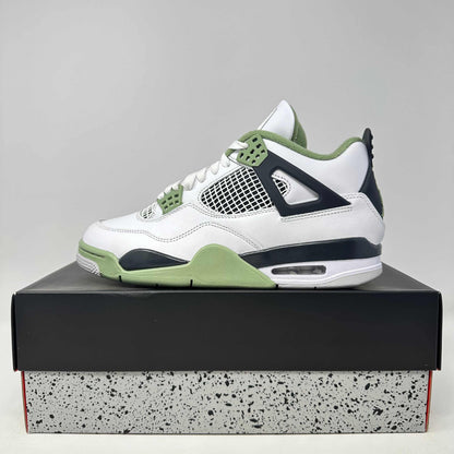 Jordan 4 Retro Seafoam women's sneaker in white and green on box, brand new with accessories