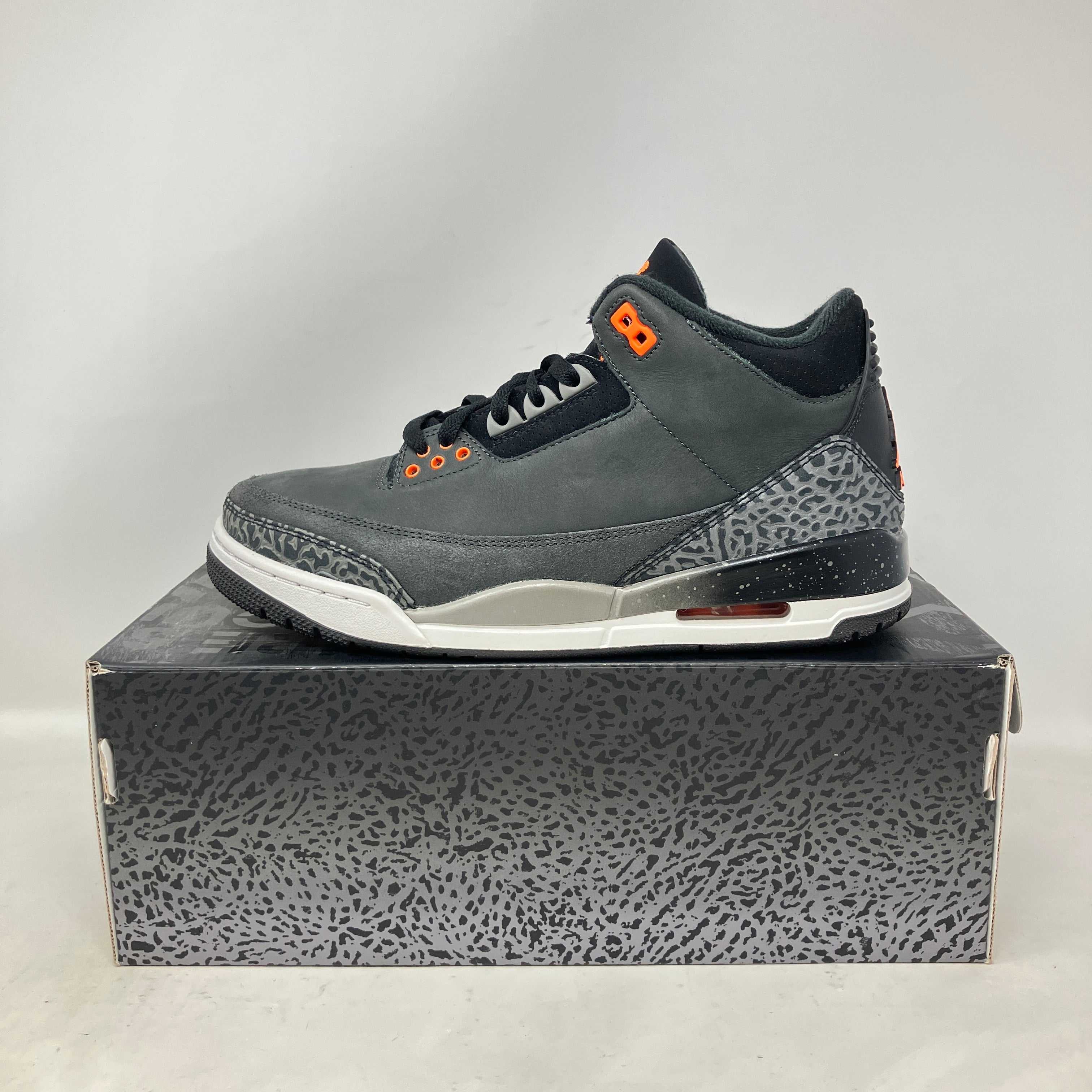 Jordan 3 Retro Fear Pack 2023 sneaker in black and grey with orange accents on shoebox