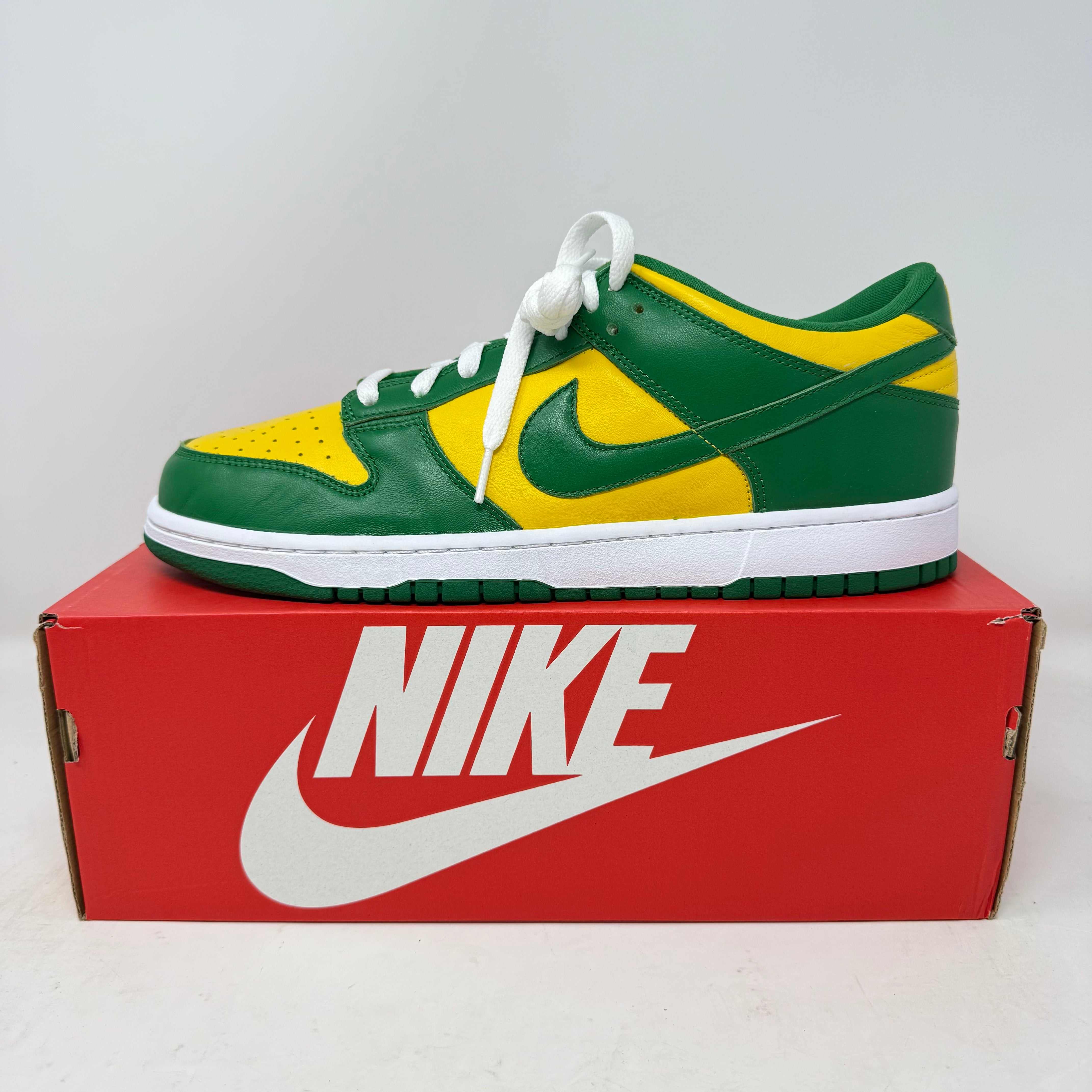 Nike Dunk Low Brazil sneaker in green and yellow on red Nike box, brand new with accessories included