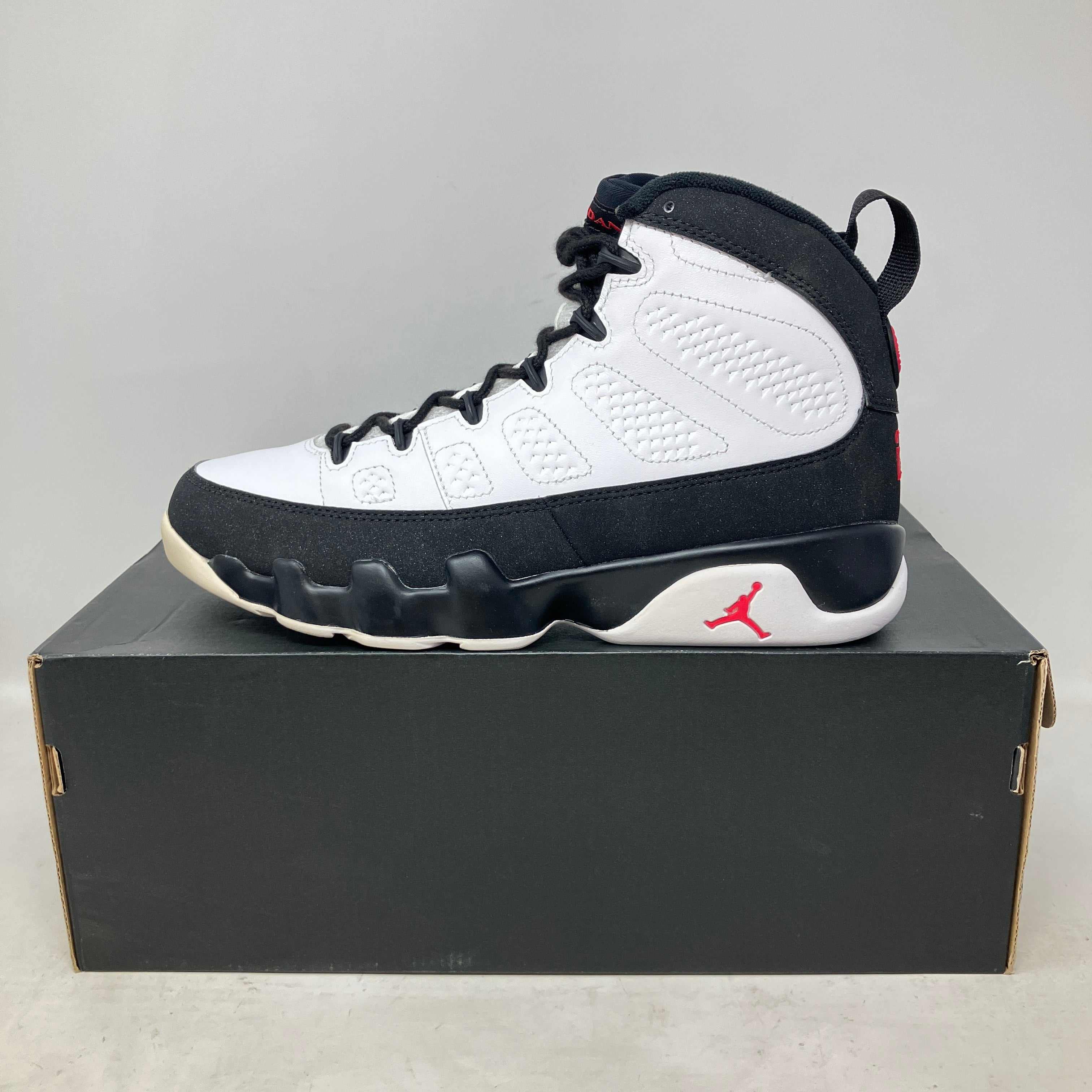 Jordan 9 Retro OG 2016 sneaker in black, white, and red on box, brand new condition with accessories included