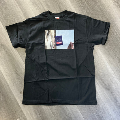Black Supreme Banner Tee with street banner graphic, brand new, 21" pit to pit, 27" length