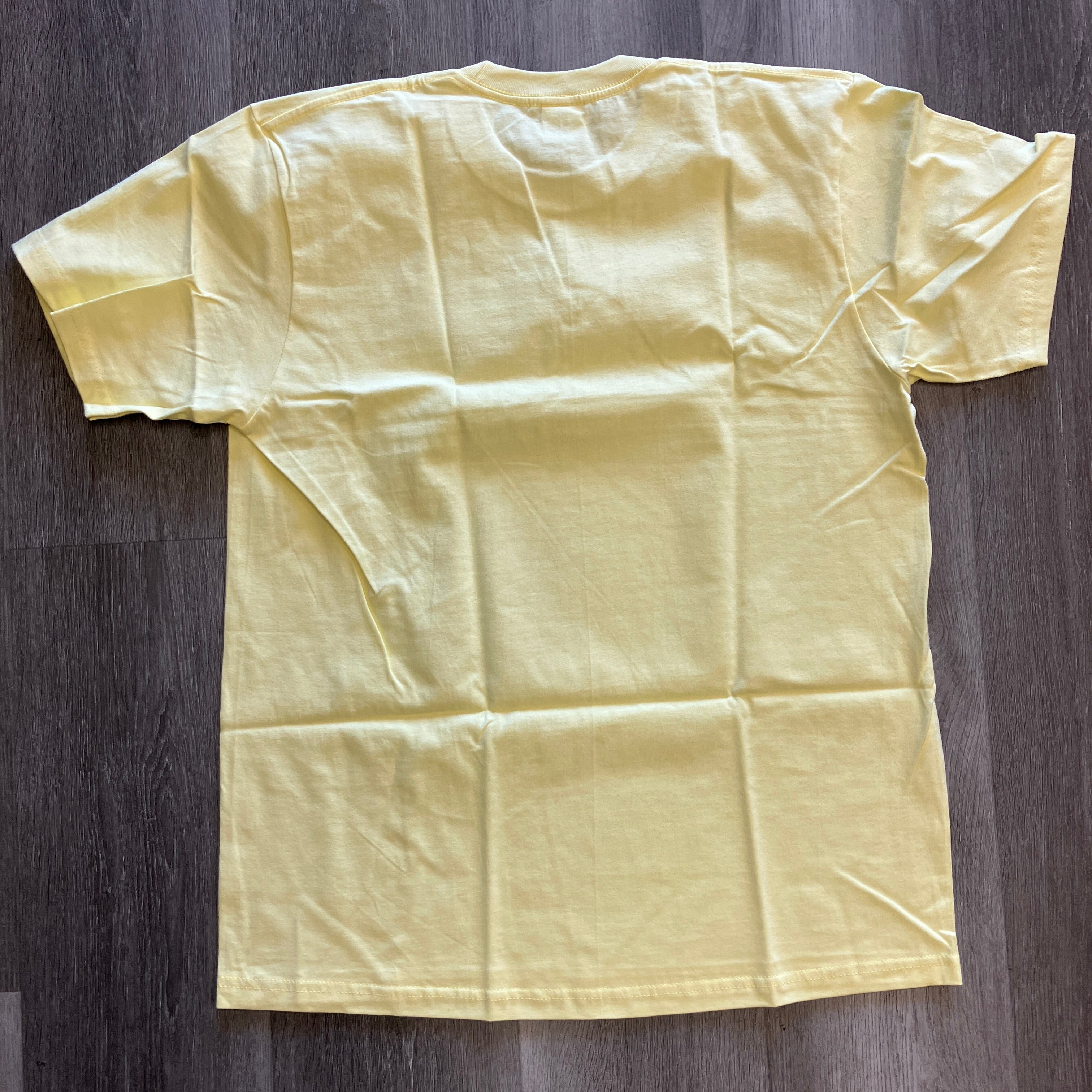 Supreme KAWS Chalk Logo Tee Pale Yellow