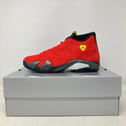 Jordan 14 Retro Ferrari 2025 red suede sneaker with Ferrari logo on a grey shoebox