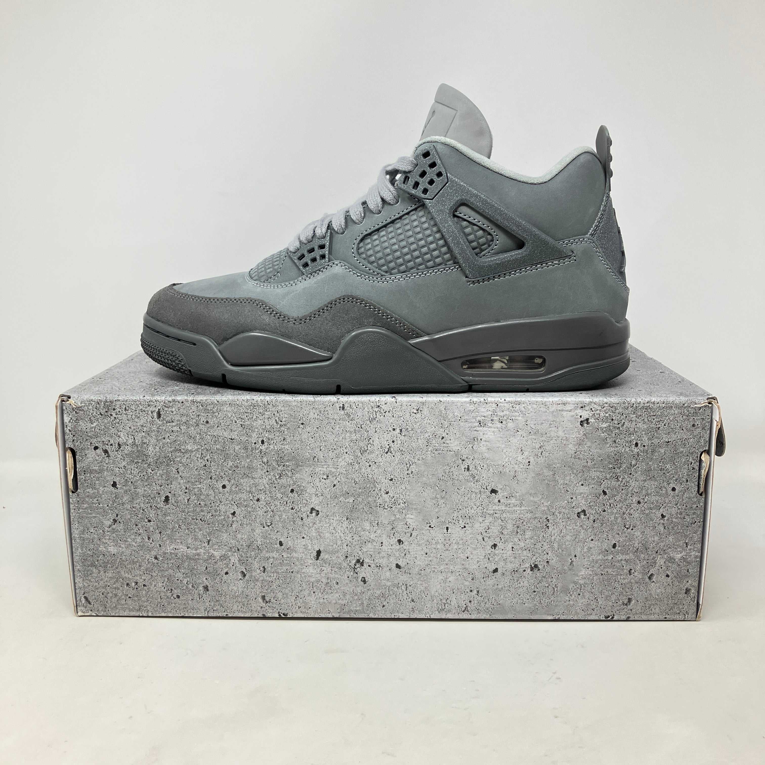 Jordan 4 Retro SE Paris Olympics Wet Cement grey sneaker on matching cement-style box pre-owned with accessories included