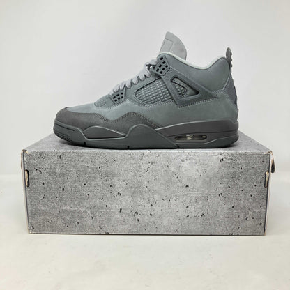 Jordan 4 Retro SE Paris Olympics Wet Cement grey sneaker on matching cement-style box pre-owned with accessories included