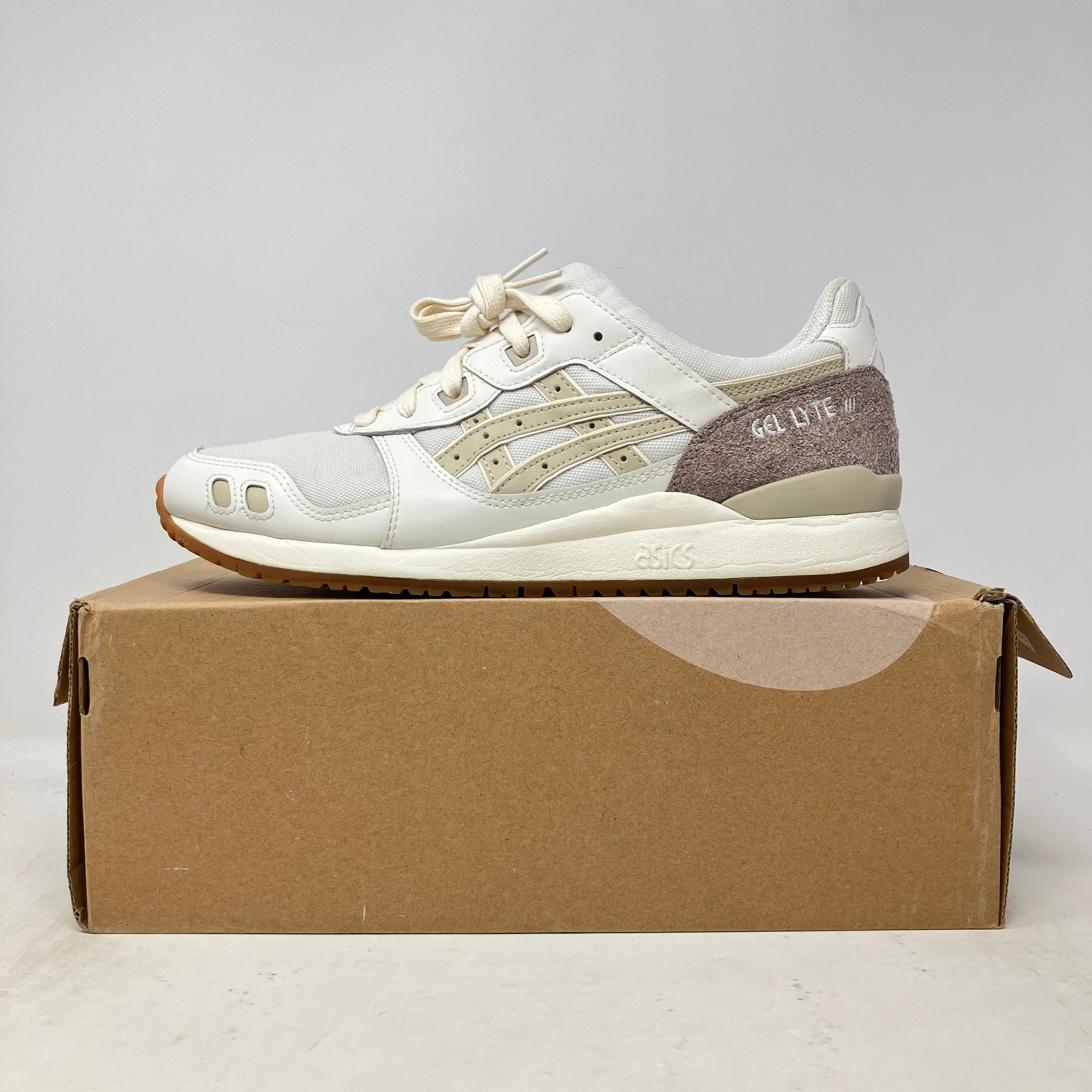 Side view of pre-owned ASICS Gel-Lyte III Earth Day Pack sneaker on brown box