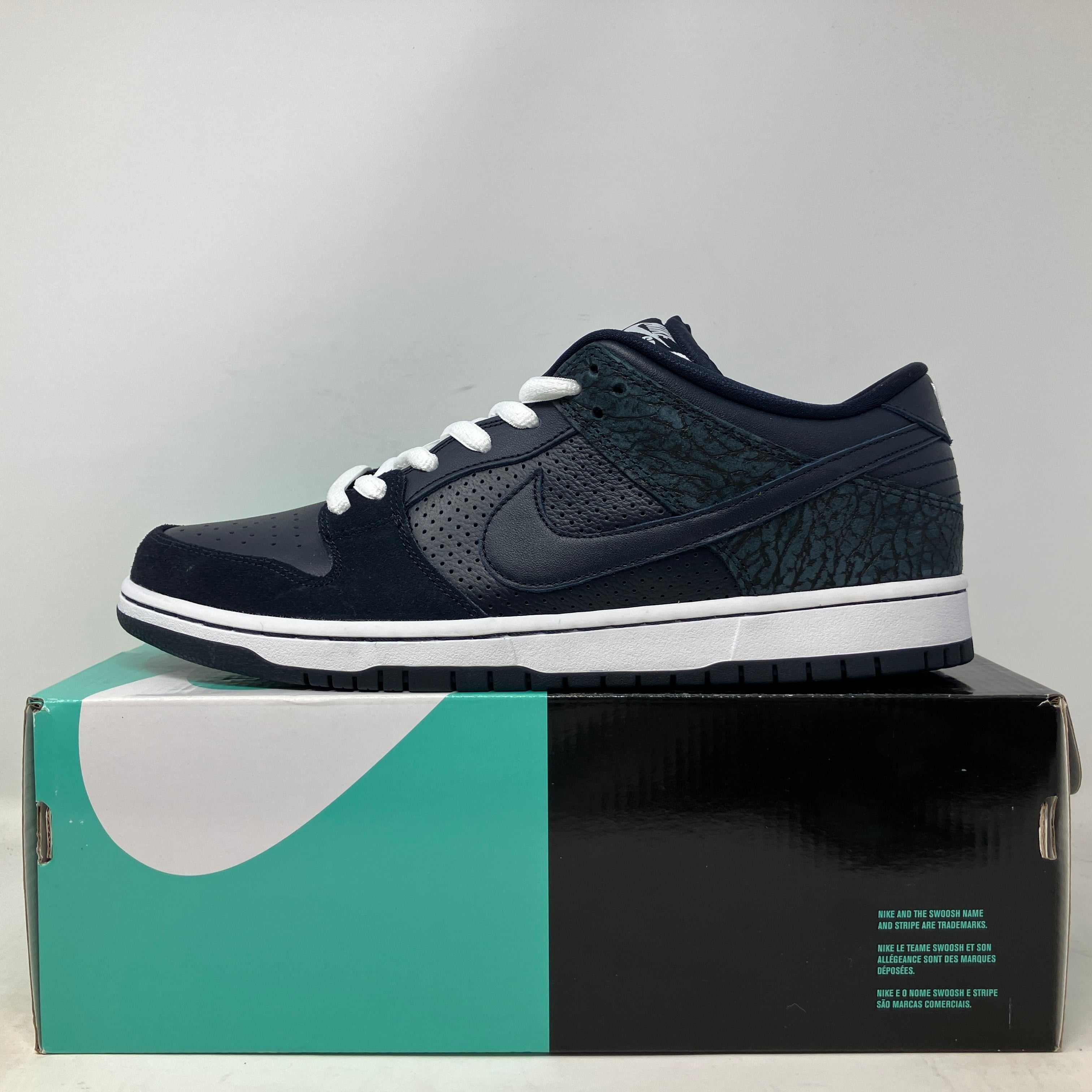 Nike SB Dunk Low Murasaki Ride Life sneakers on display with original box, brand new condition.